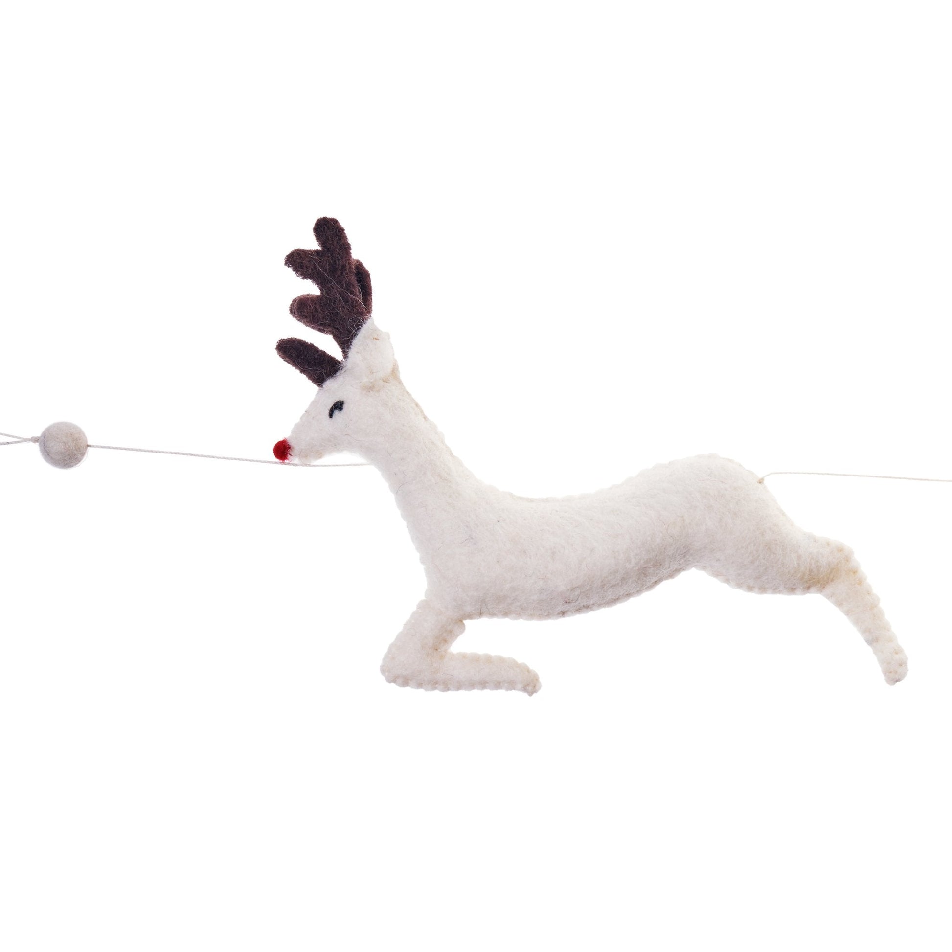Felt garland closeup of white reindeer.
