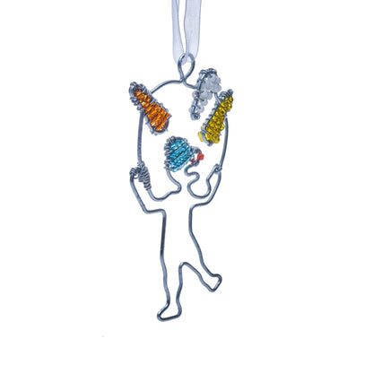 Wire and bead ornament of a circus person juggling yellow, white, and red juggling pins.