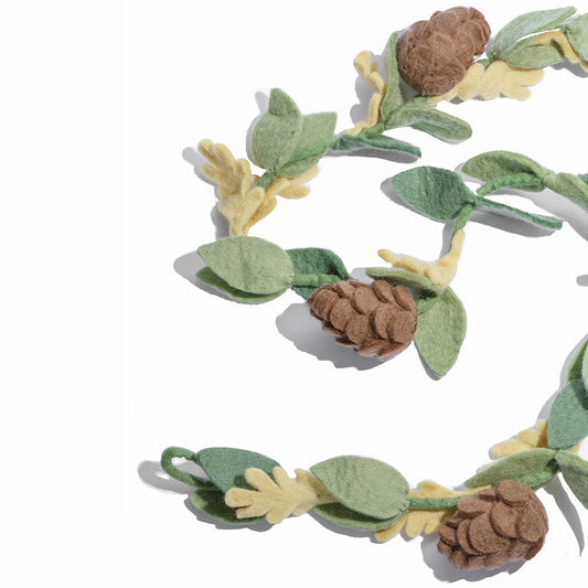 Felt garland with green leaves and brown pinecones.