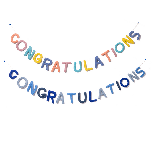 Two felt garlands spelling out Congratulations. The top one in pastel colors of peach, pink, teal, yellow, and blue. The bottom one in various shades of blue alternating cobalt blue, pale blue, baby blue, and greyish blue.
