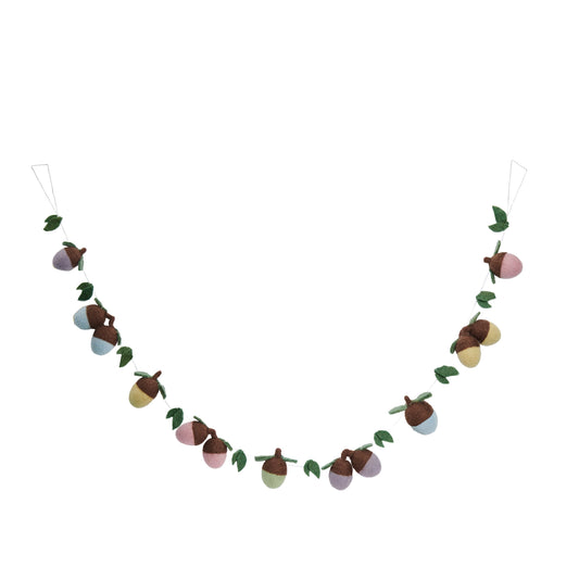 Felt garland of acorns that are pastel colors of purple, blue, yellow, pink, and green with green leaves between them.