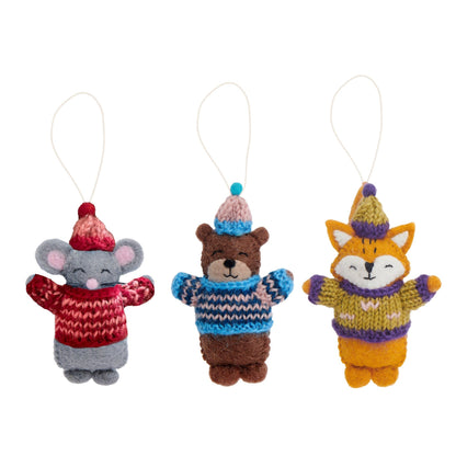 Felt ornaments of a mouse, a bear, and a fox in knitted sweaters and hats.