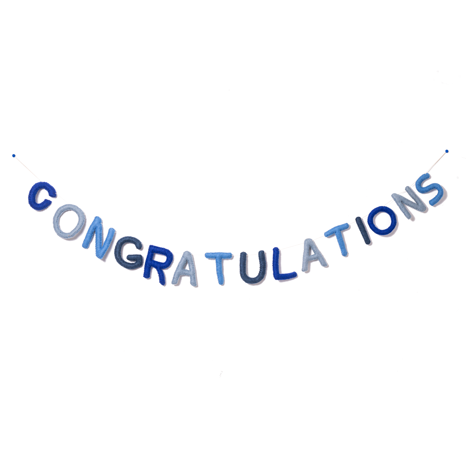 Felt garland spelling out Congratulations in various shades of blue alternating cobalt blue, pale blue, baby blue, and greyish blue.