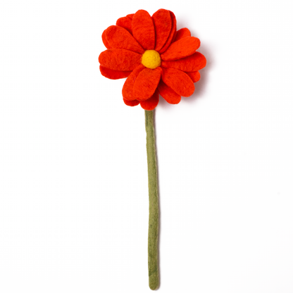 Reddish orange felt daisy flower.