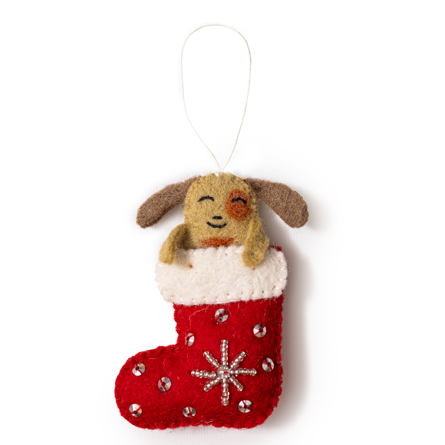 Felt ornament of a tan dog sticking out of a red and white Christmas stocking.