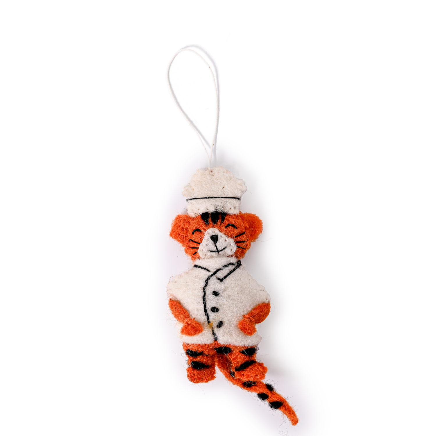 Felt ornament of a tiger in a chef's hat and coat.