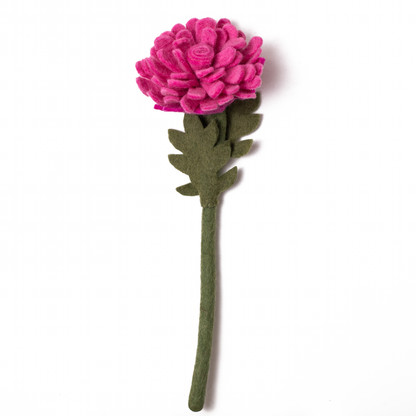 Bright pink felt flower with many petals.