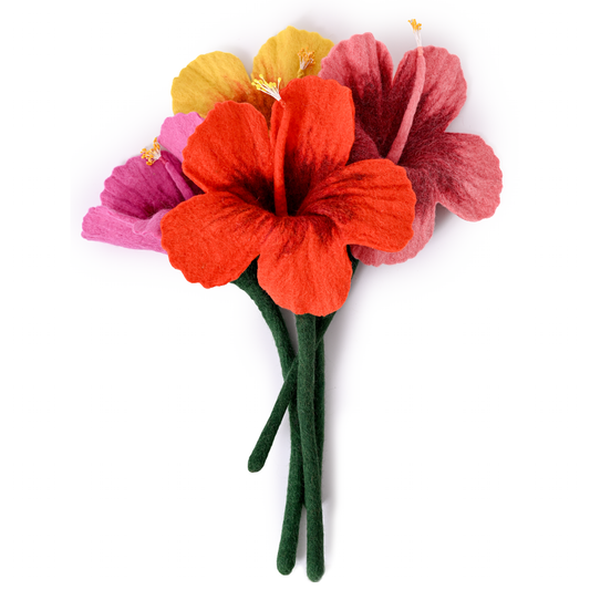 Bunch of felt hibiscus flowers in red, pink, yellow, and light pink.