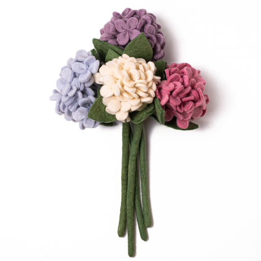 Bunch of felt hydrangea flowers in light blue, purple, pink, and white.