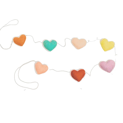 Felt garland of hearts in alternating colors of orange, teal, peach, yellow, pink and red.