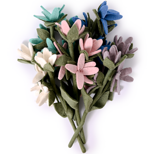Bunch of felt watsonia flowers in white, light blue, pink, bright blue, and light purple.
