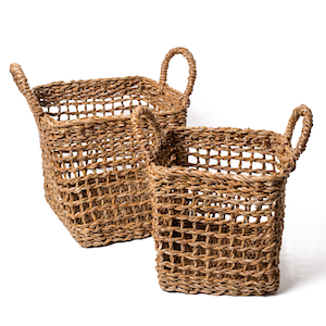Set of two brown woven baskets with net design.