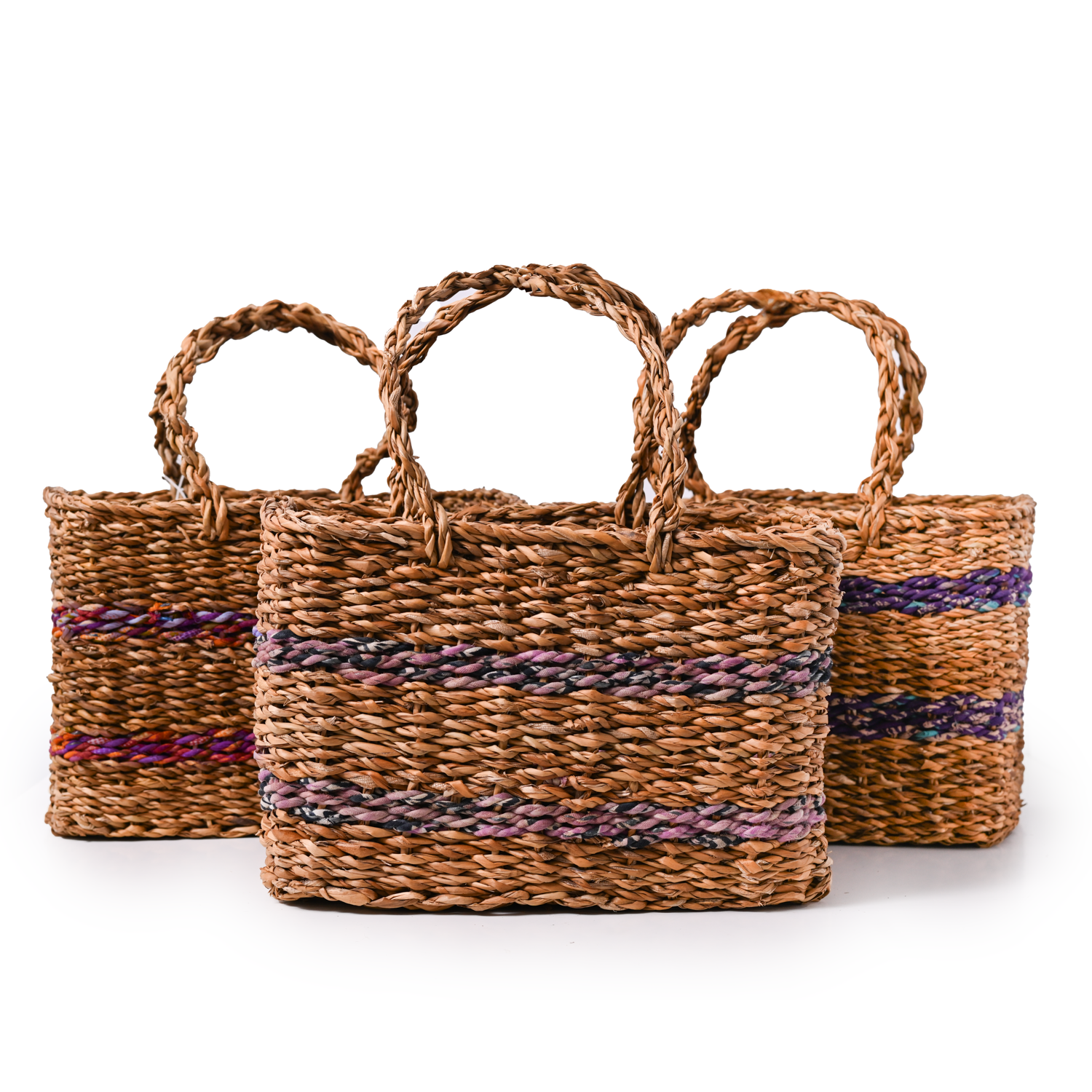 Three woven brown baskets, each with two multi-colored stripes.