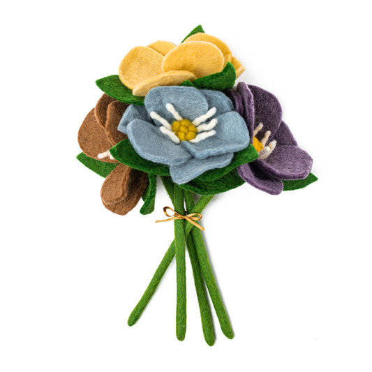 Bouquet of felt Hepatica flowers in brown, yellow, purple, and blue.