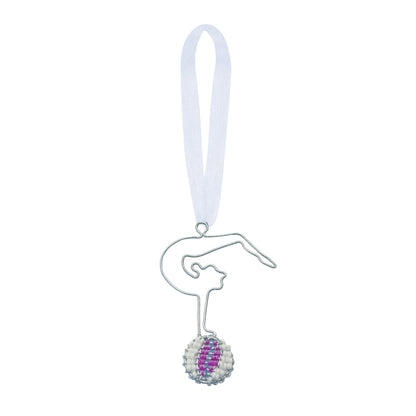 Wire and bead ornament of a circus woman gymnast doing a handstand backbend on a purple and whiteball.