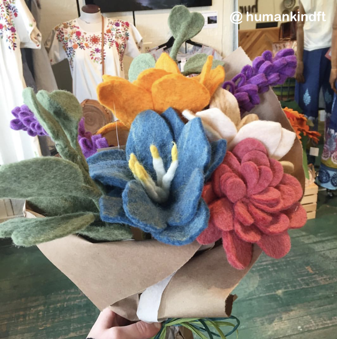 Purple Lavender flower in a bunch with other various felt flowers.