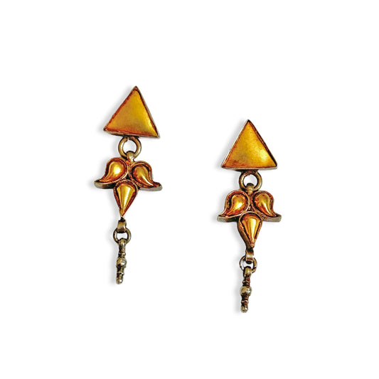 Pair of gold foil earrings with geometric design.