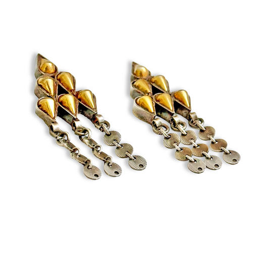 Pair of gold foil post earrings with tribal design.