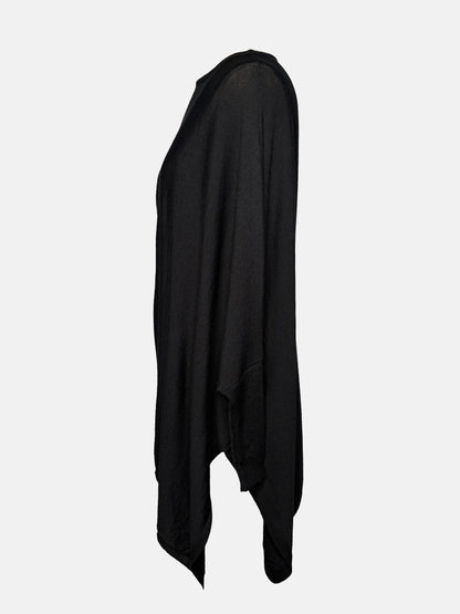 Side view of Black drapey boatneck sweater.