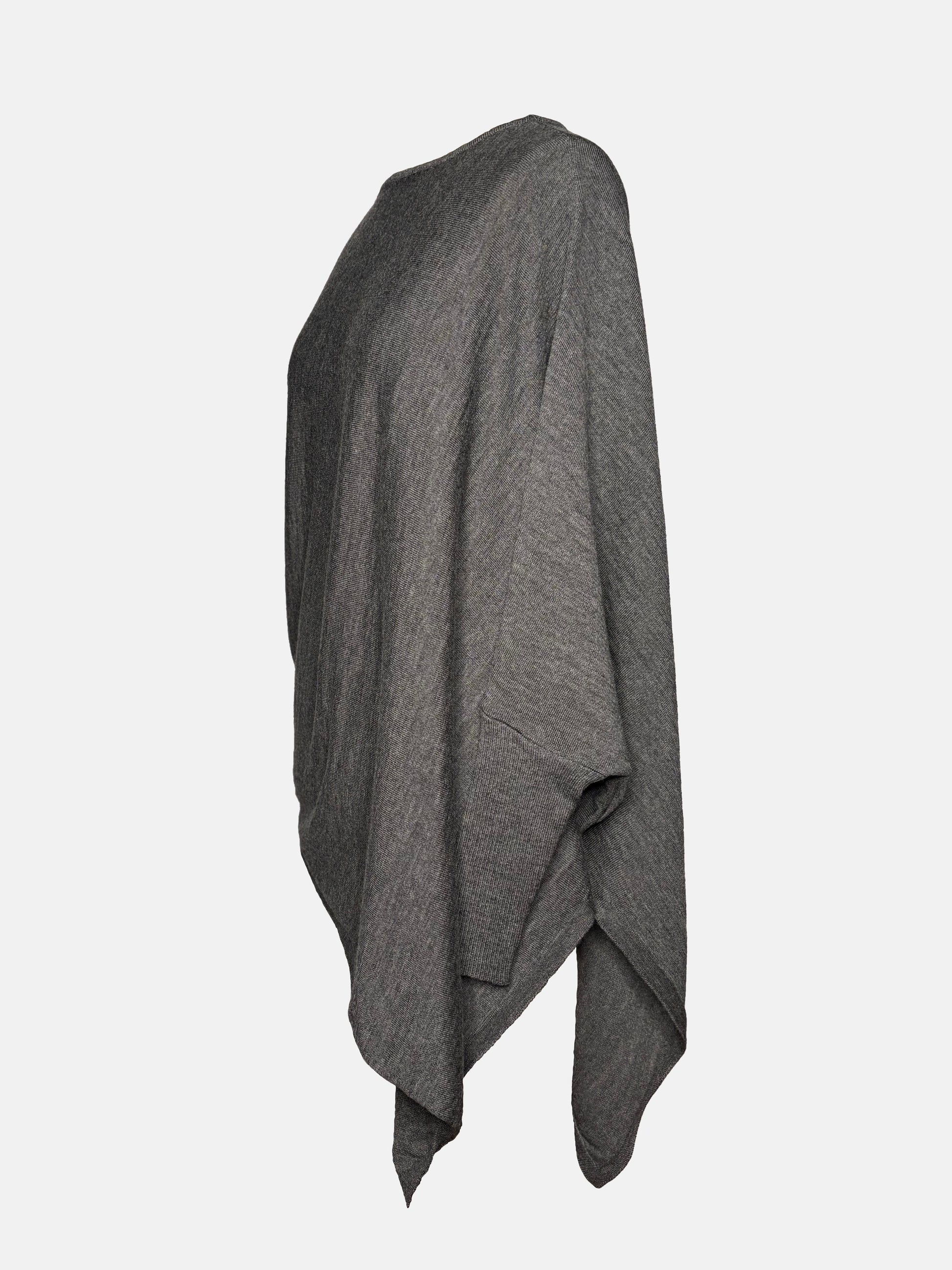 Side view of grey drapey boatneck sweater.