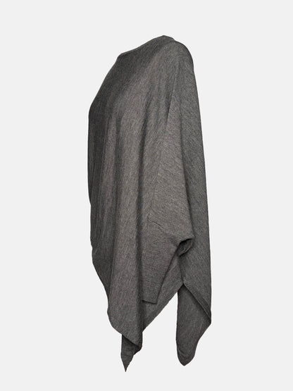 Side view of grey drapey boatneck sweater.