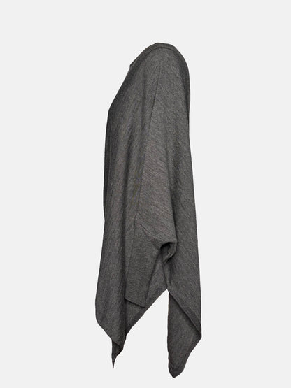 Side view of grey drapey boatneck sweater.