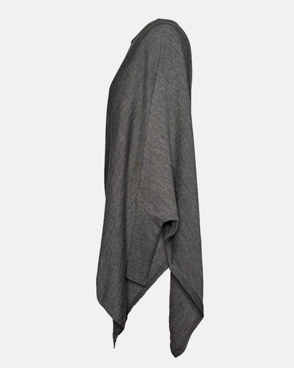 Side view of grey drapey boatneck sweater.