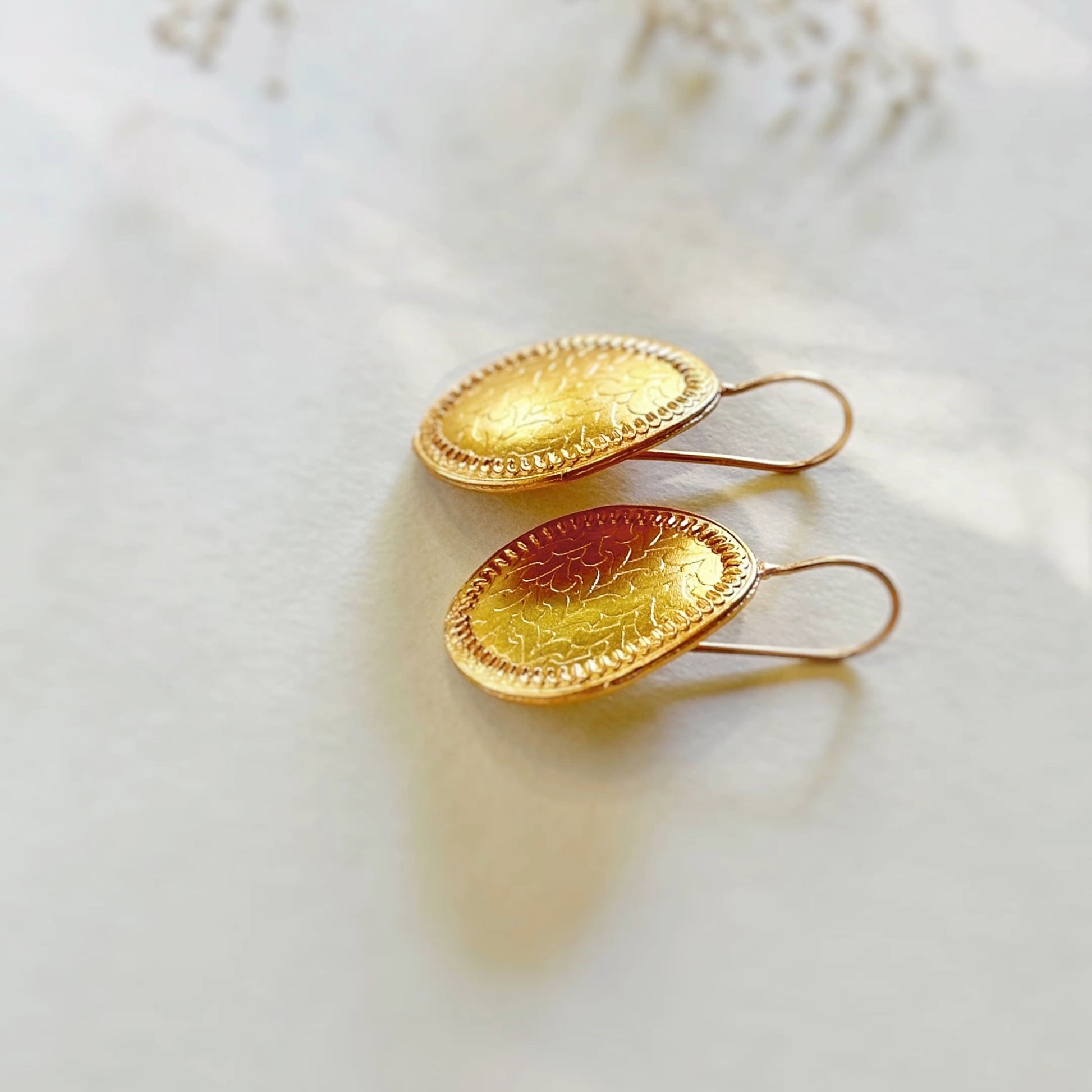 Pair of gold plated earrings.