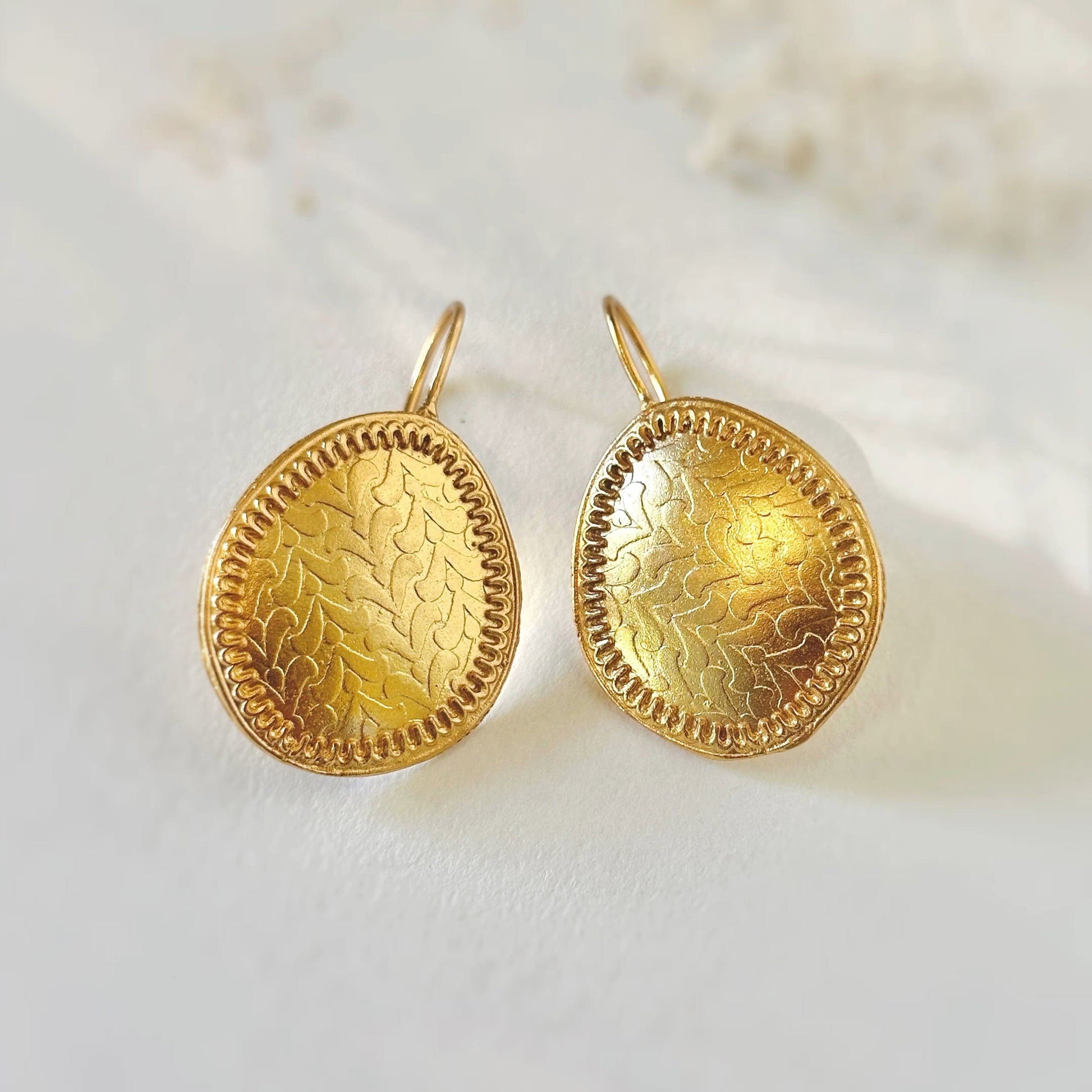Pair of gold plated earrings.
