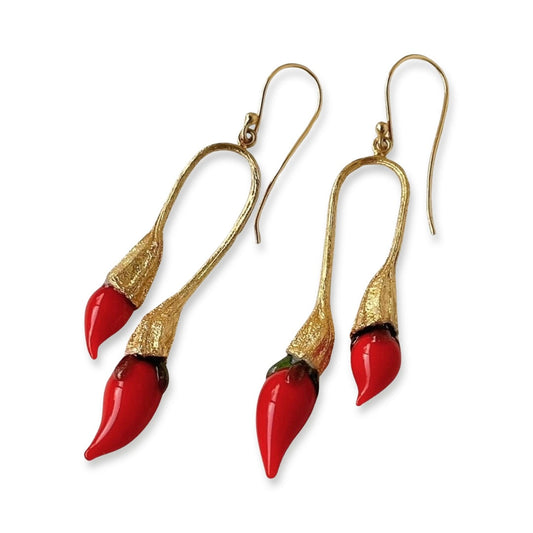 Pair of red and gold double chili pod earrings with silver colored findings.