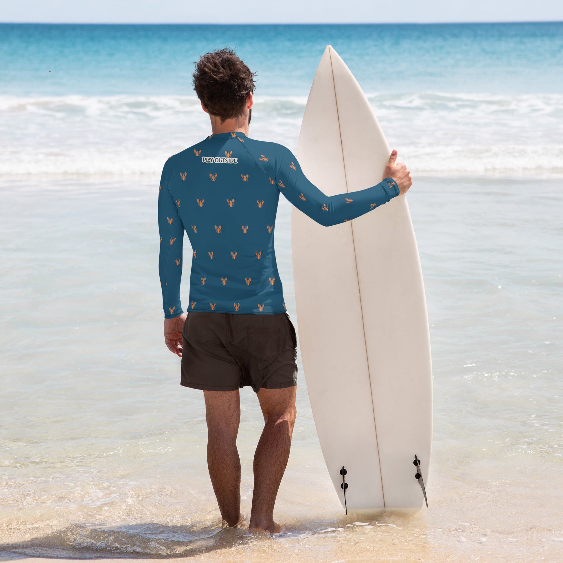 A men’s rash guard featuring bold red lobster prints on a navy blue background, shown from the front. Family Matching