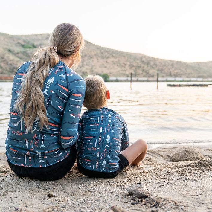 Mother and child matching in sun safe Play Outside rash guards