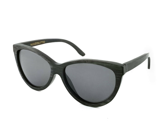 Diagonal view of black bamboo sunglasses with black frames.
