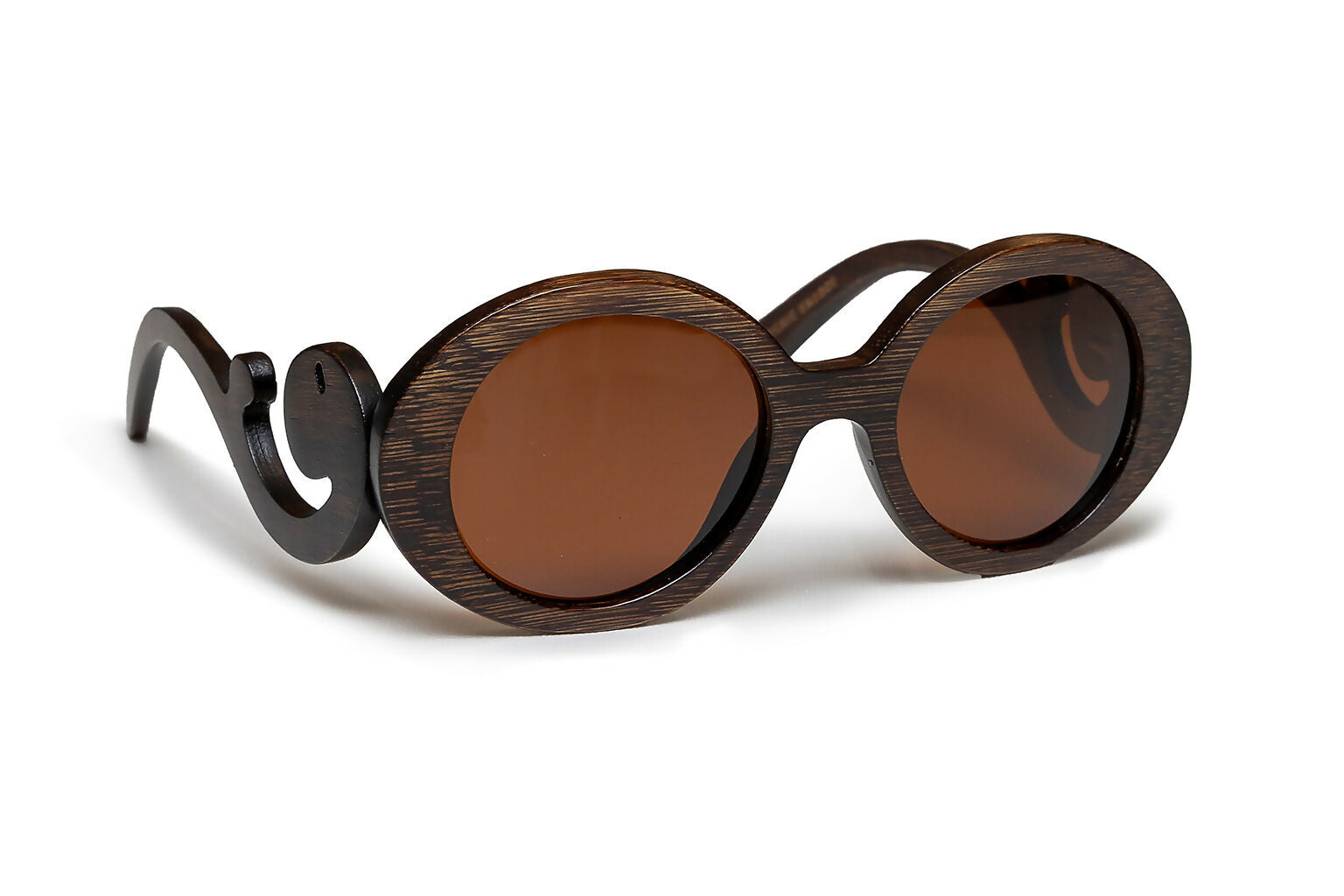 Brown bamboo sunglasses with brown lenses with scroll like design on arms.