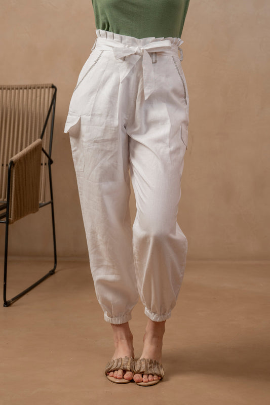 Front partial view of woman wearing Yama | Cargo Jogger Pants in White and green shirt.