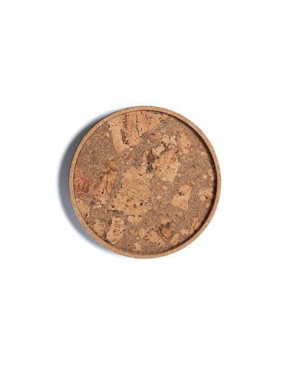 Top view of a circular cork Lazy Susan spinning tray with acacia wood base.