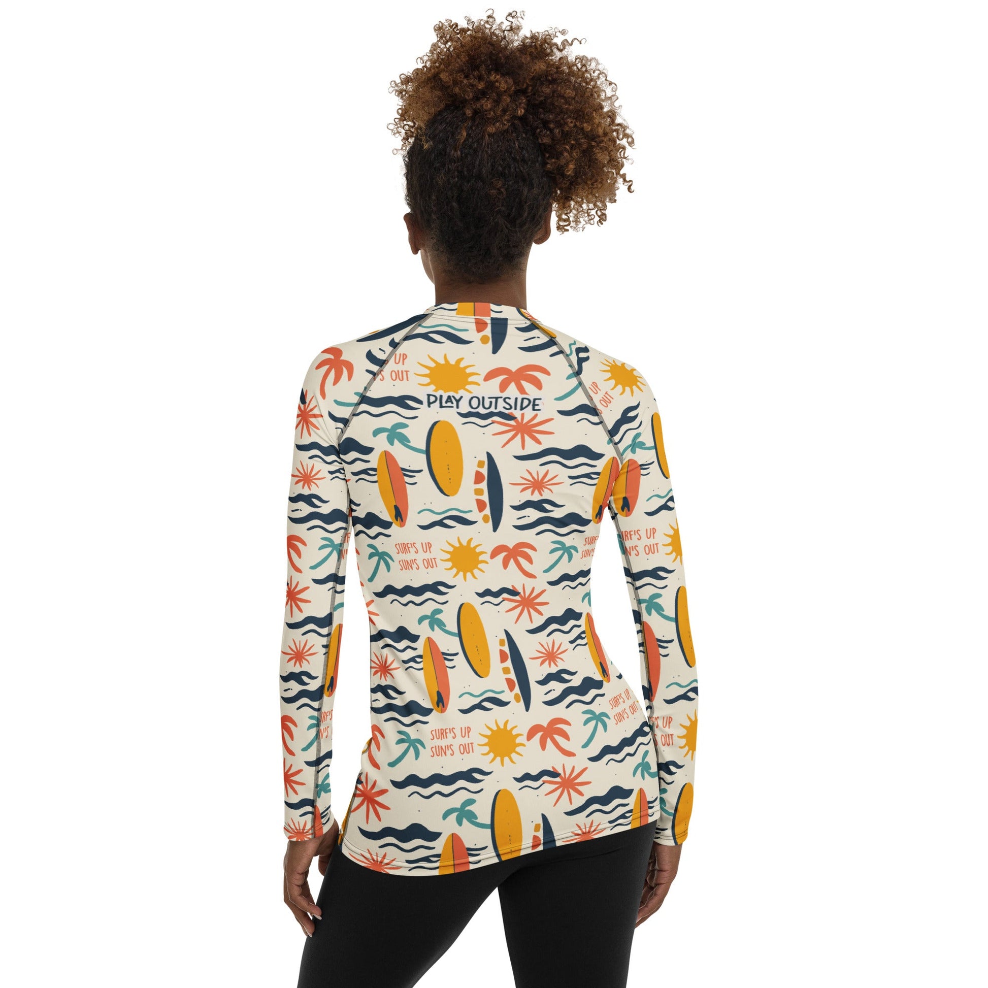 A lightweight women’s rash guard with a Surf’s Up theme, offering breathable, quick-drying fabric for outdoor use.