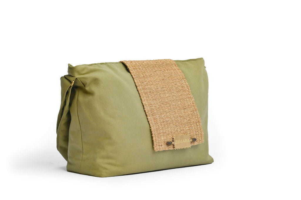 Front side view of large green bag with sisal details.