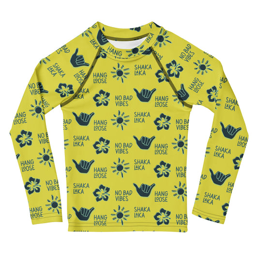 Yellow rashguard with navy designs of the  sun, hibiscus flowers, hang loose hand sign, and the words hang loose, no bad vibes, and shaka laka.