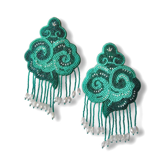 Pair of light and dark green cloud earrings with tassels.