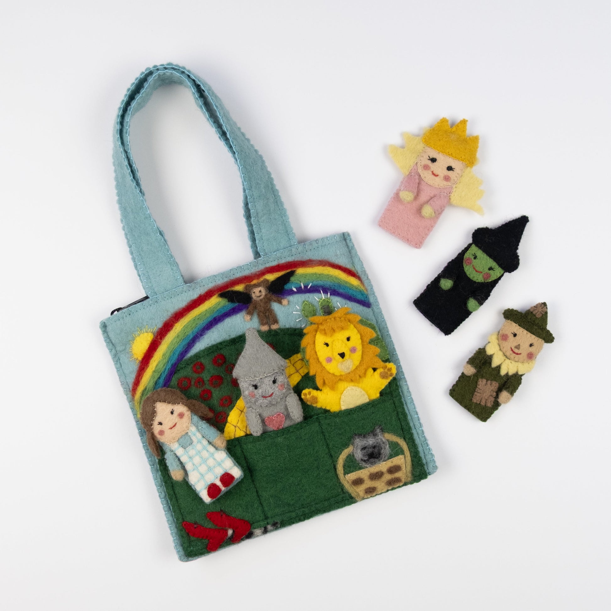 Felt puppet bag for kids with wizard of oz themed characters of Dorothy, the Tin Man, The Cowardly Lion, Glinda the Good Witch, The Wicked Witch of the West, and the Scarecrow.