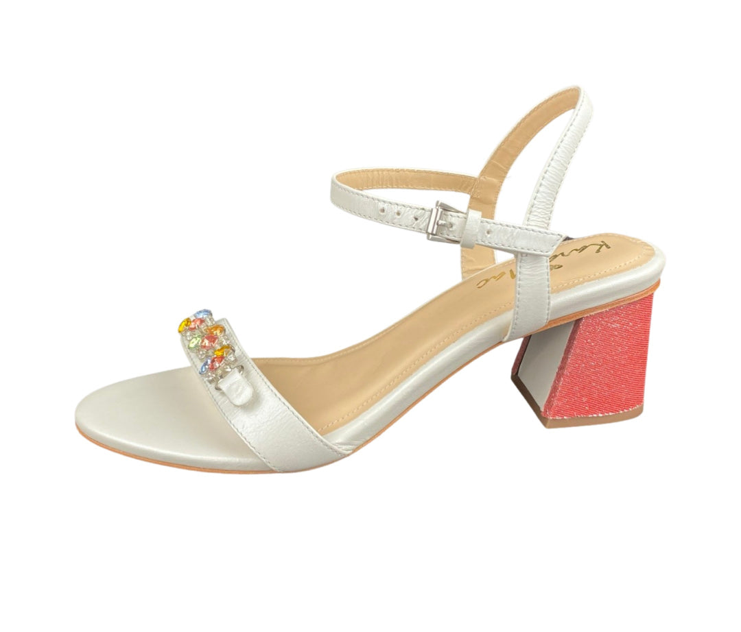 Pearl sandal with red colored toe strap and heel cover.