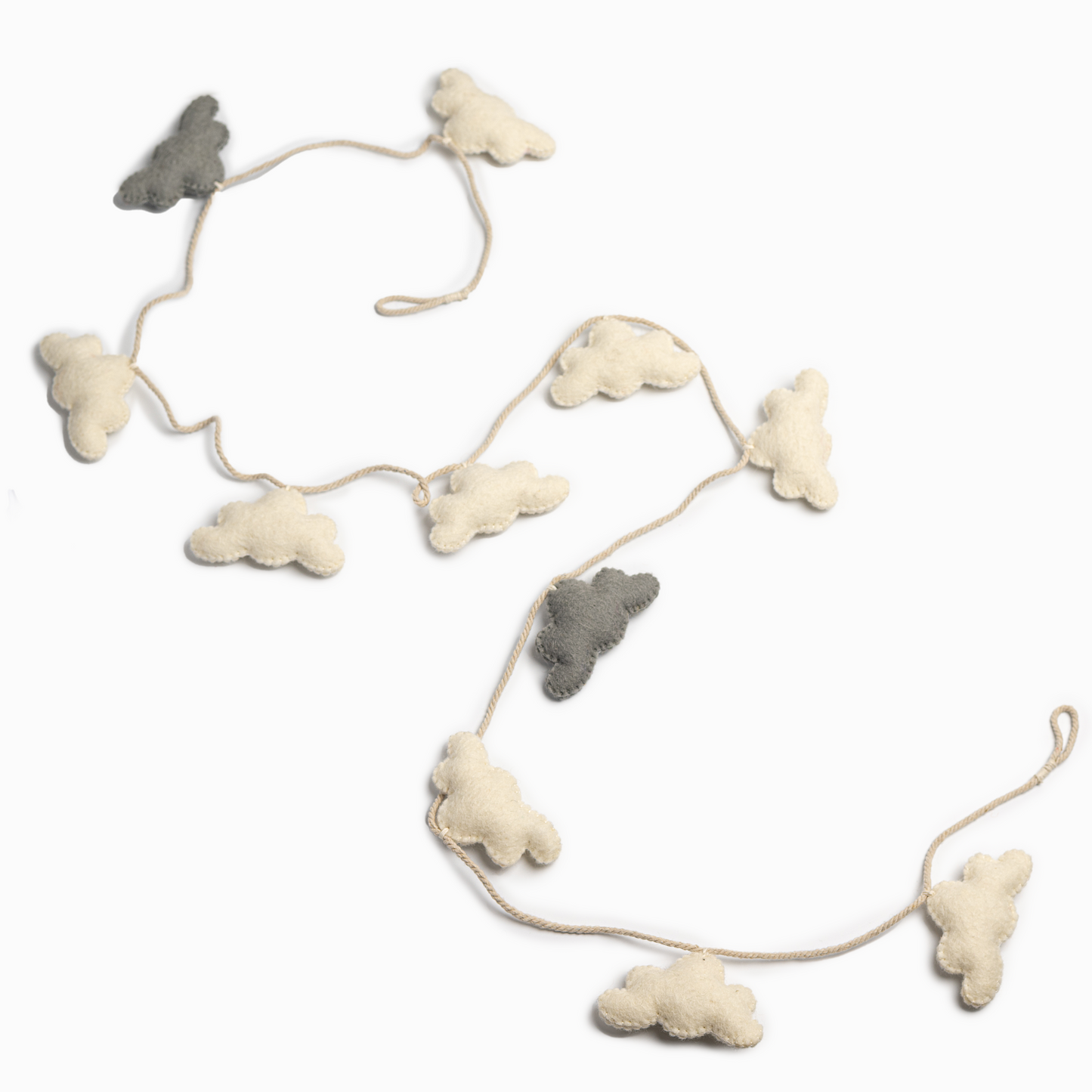 Felt garland of white and grey clouds.