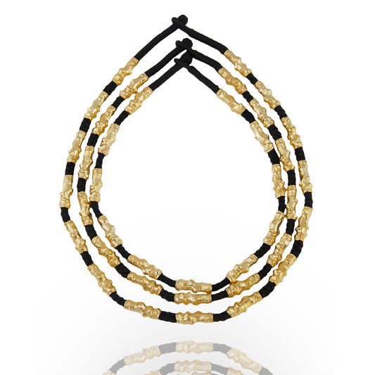 stacked gold plated and black thread necklace