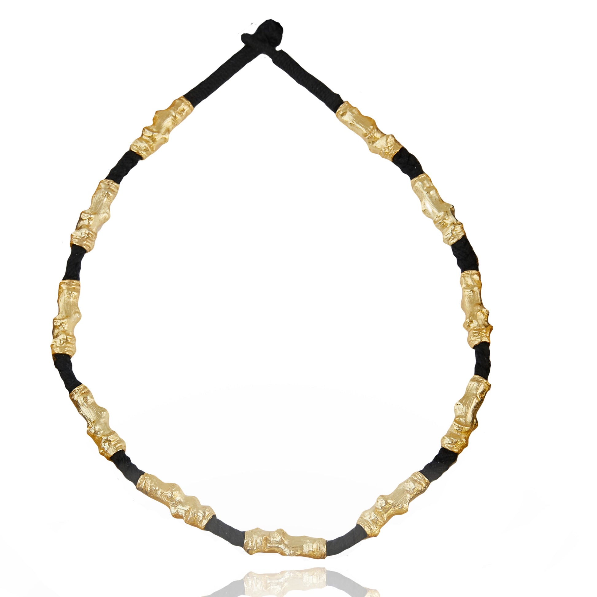gold plated and black thread necklace