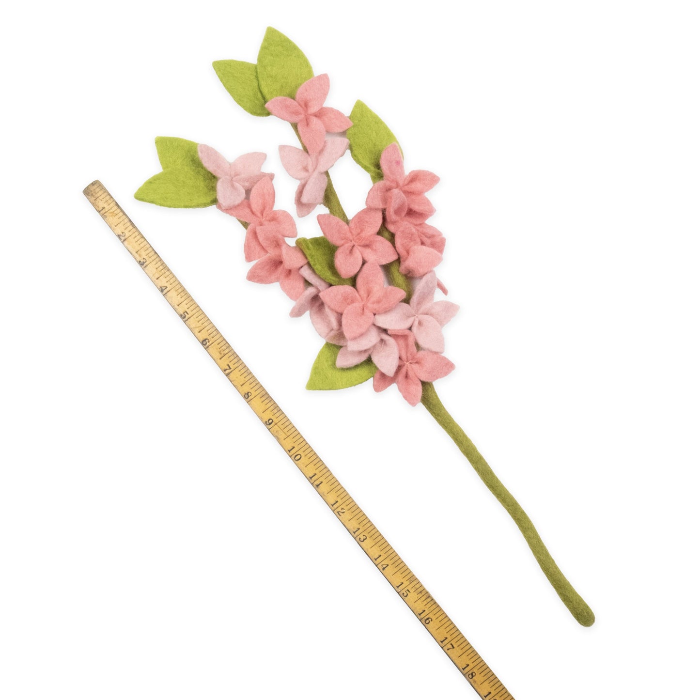 Pink felt forsythia flower next to measuring tape showing it is 20.5 inches tall..