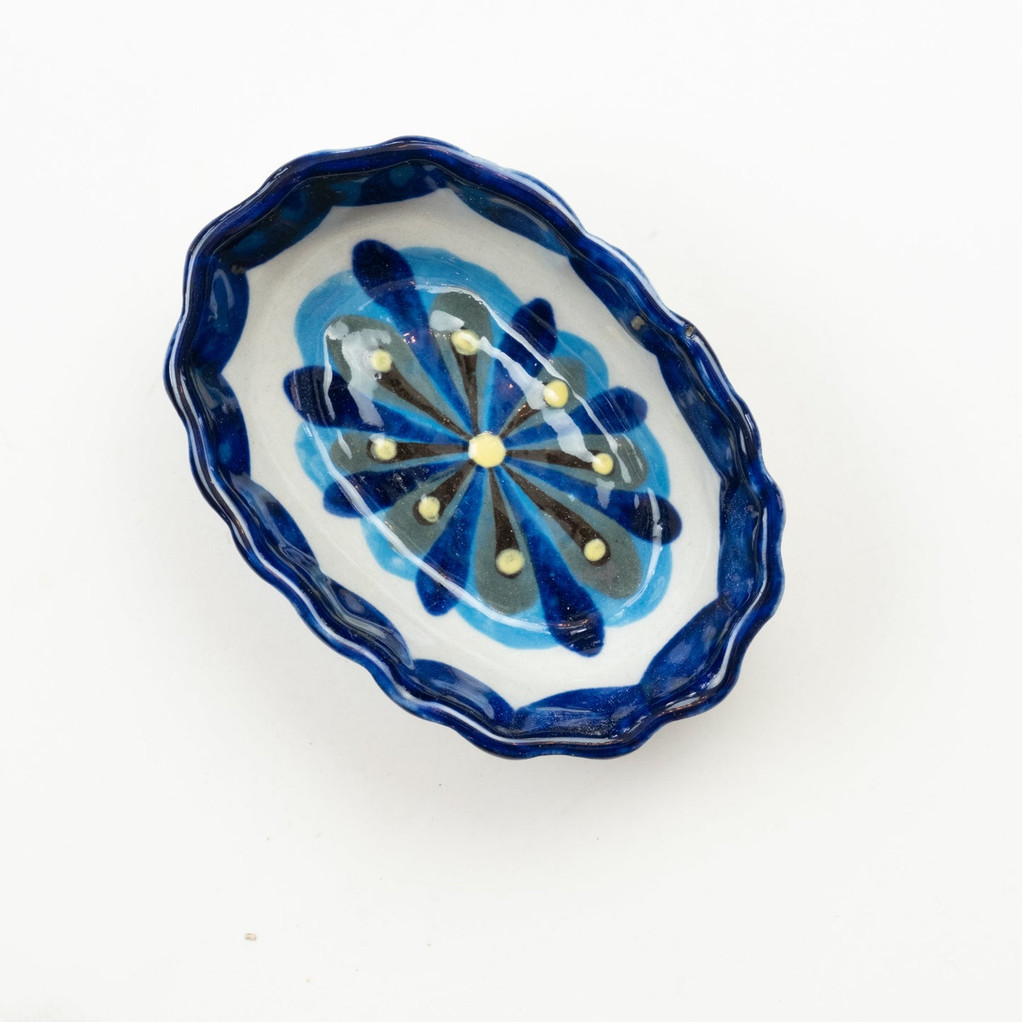 Blue and white painted oval tapas bowl.