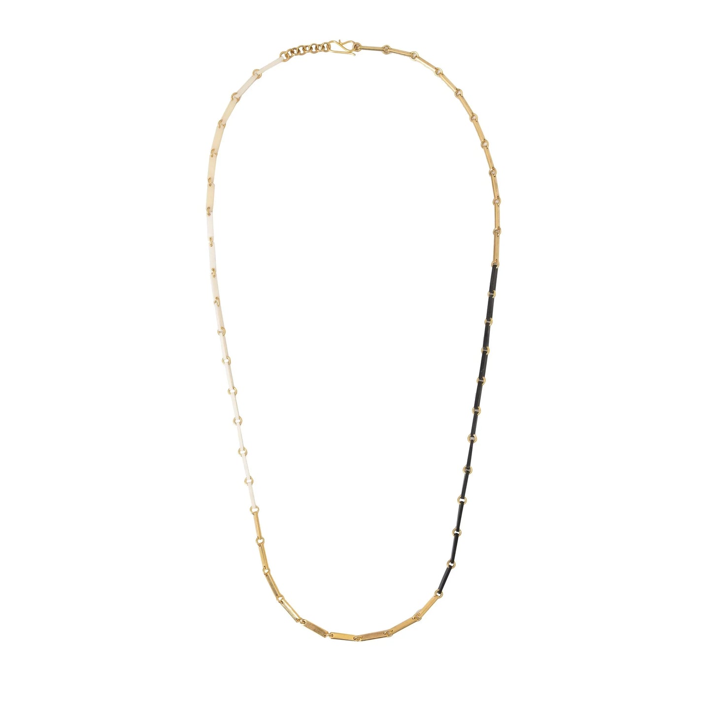 White, gold, and black link necklace on a white background.
