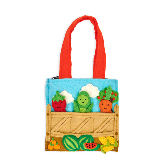 Farmer's market felt puppet bag with with three finger puppets, a tomato, a carrot, and a pea pod in crates.