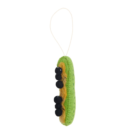 Felt ornament of Ants on a Log snack of celery with peanut butter and raisins on top.